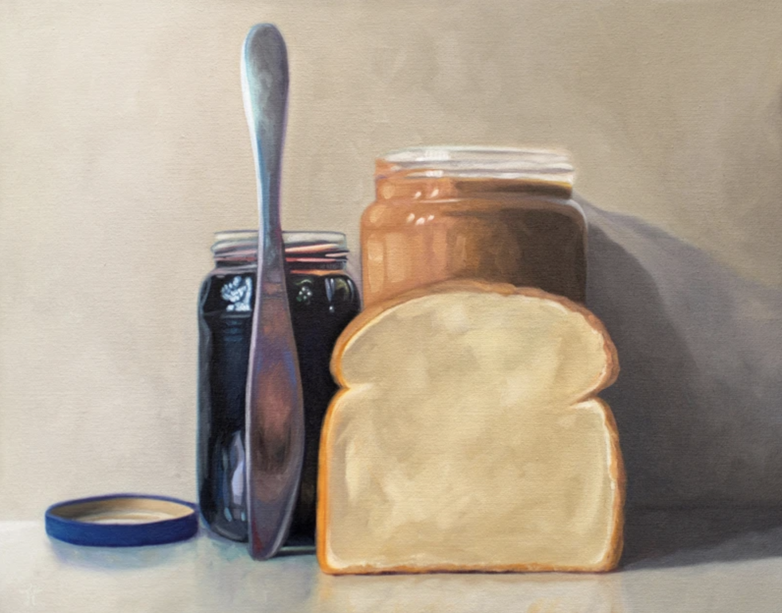 All the things required to make a peanut butter and jelly sandwich lined up and ready to go on a light and neutral backdrop with subtle reflections.